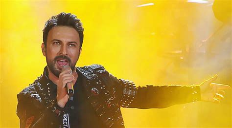 The Istanbul Rhapsody: Unveiling Tarkan Tevetoğlu's Dazzling Concert Experience!